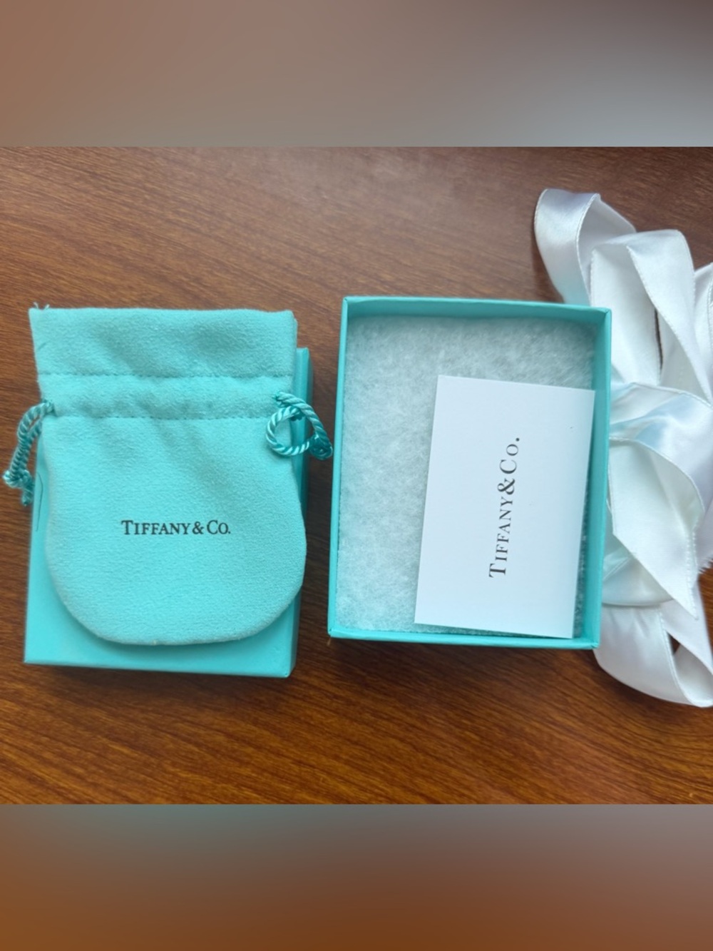 Tiffany & Co.  Blue Jewelry Pouch and paper box,